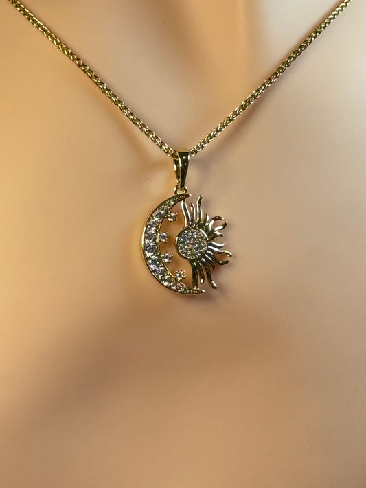 Necklace with moon and sun charm